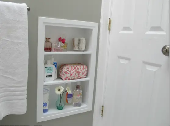 Every bathroom is deserving of built-in shelves, but especially itty bitty bathrooms that are in need of extra storage. This DIY option is great for beginners