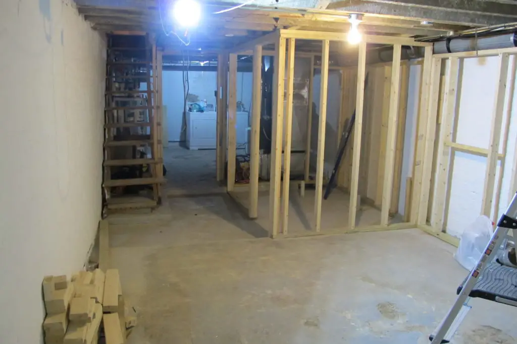 1904 rowhome basement transformation - framing and lighting the space | EffieRow.com
#basementrenovation #basementtransformation #basementreno #smallbasement #darkbasement #basementbathroom #basementaddition #exposedbasementceiling