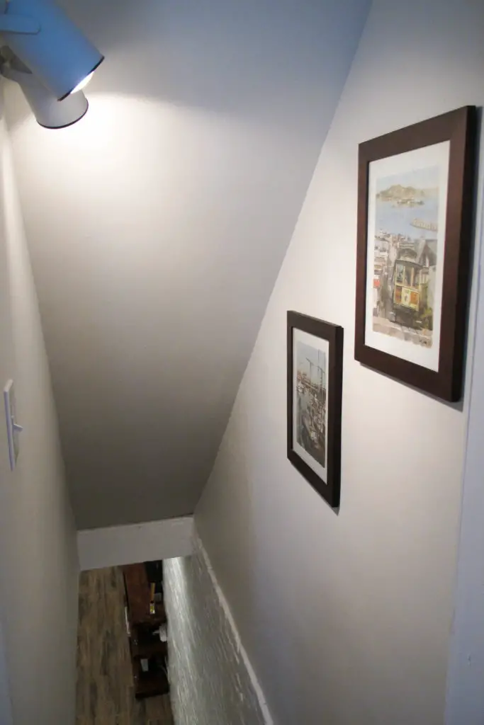 Narrow basement stairwell in a completely renovated city basement | EffieRow.com
