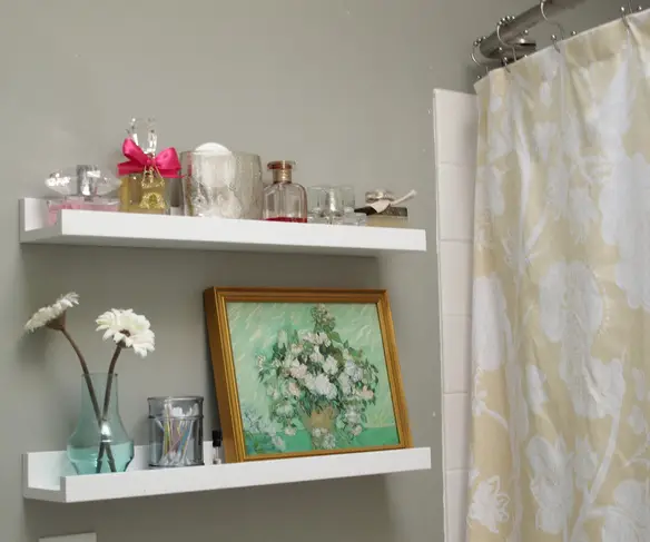 Small bathroom storage solution: picture frame shelves