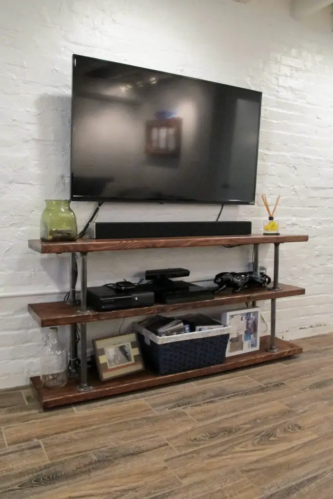Easy DIY Industrial Media Shelves with Gas Pipes