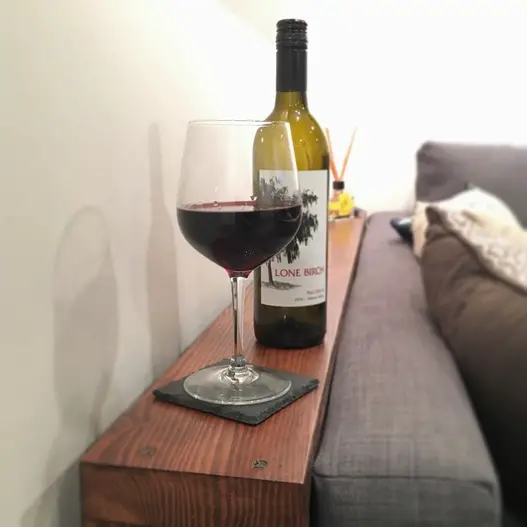 A very simple (yet functional!) shelf/table for behind the sofa