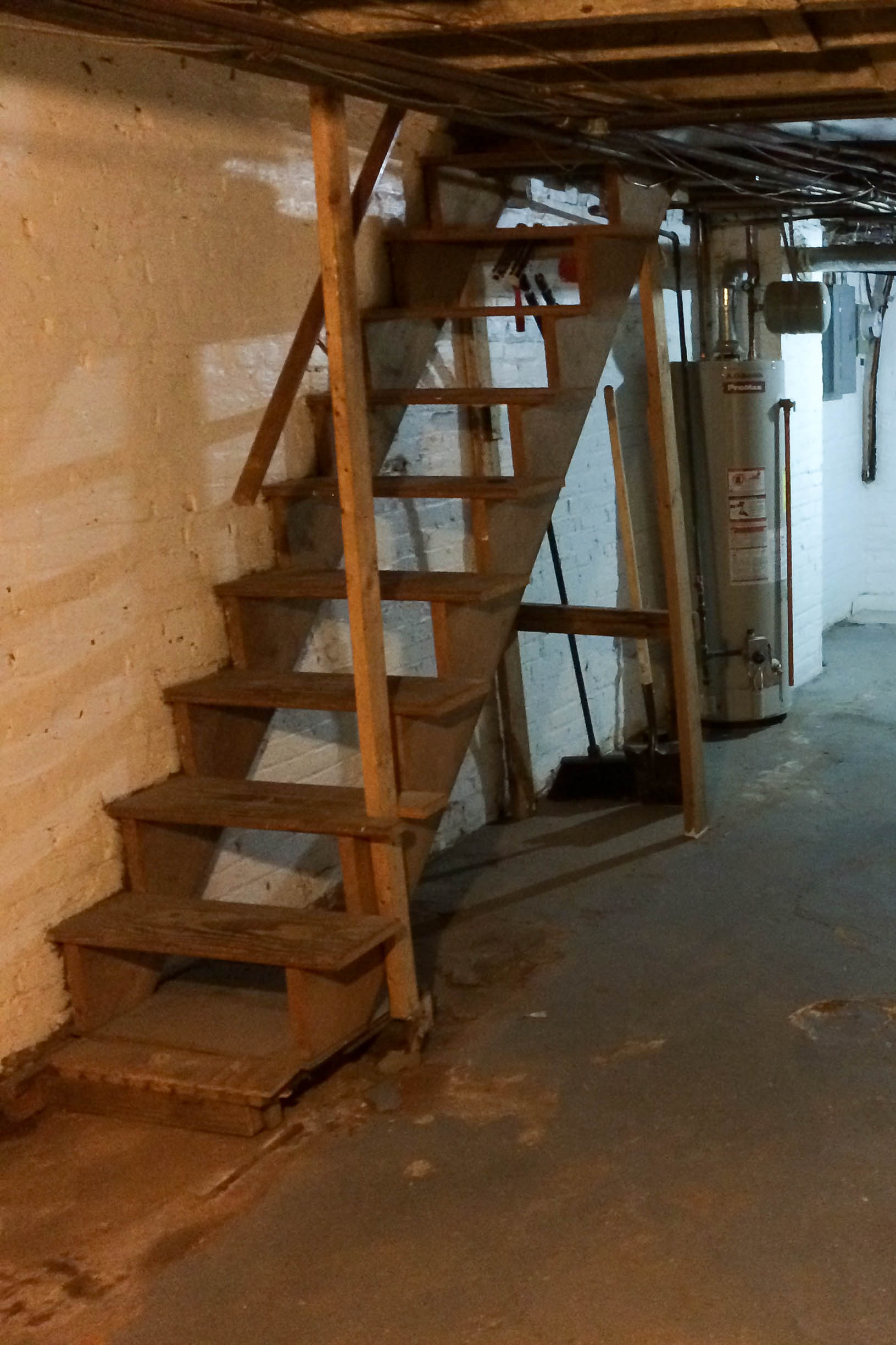 Upgrading basement stairs with paint and plywood