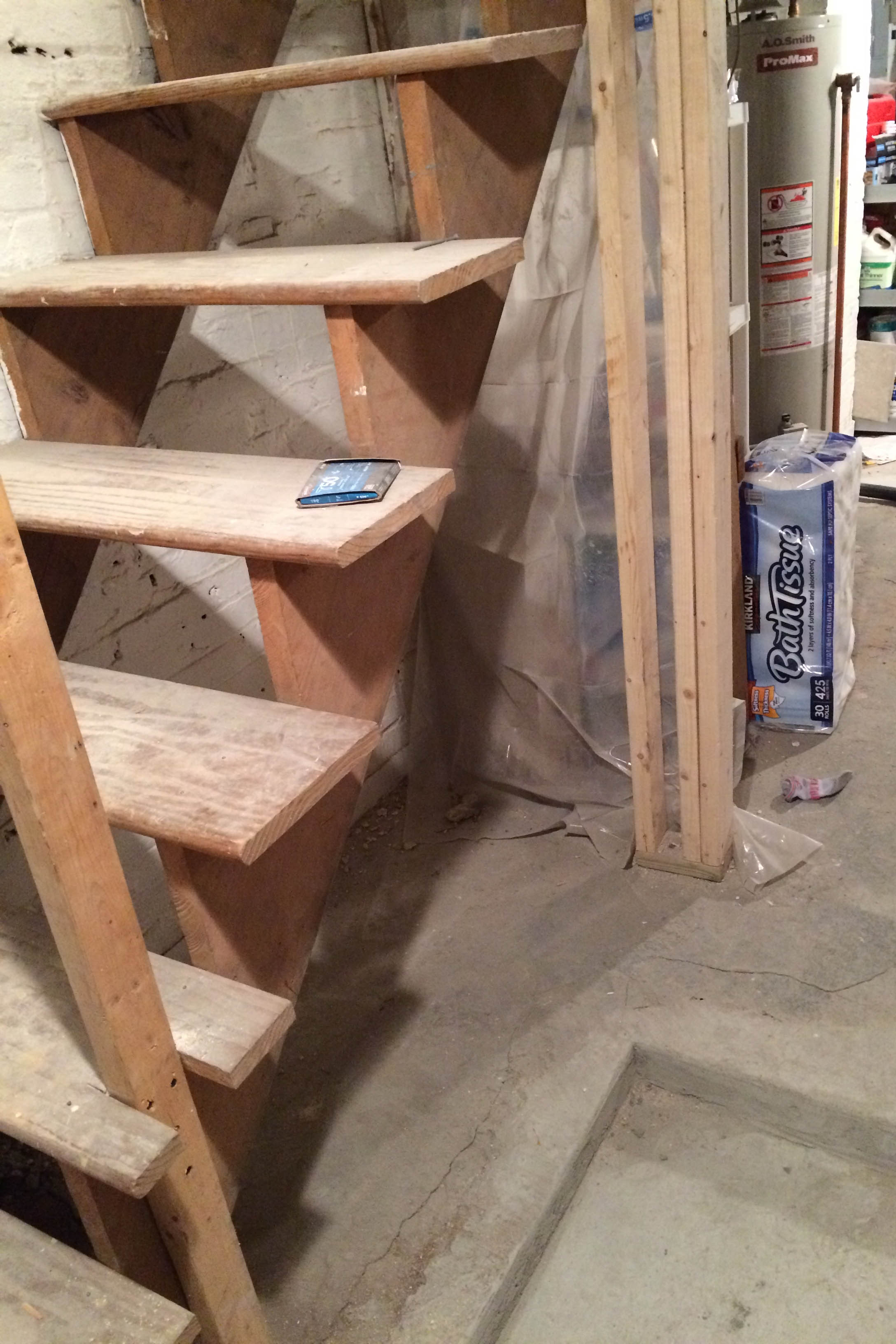 Upgrading basement stairs with paint and plywood - no need to rip them out!