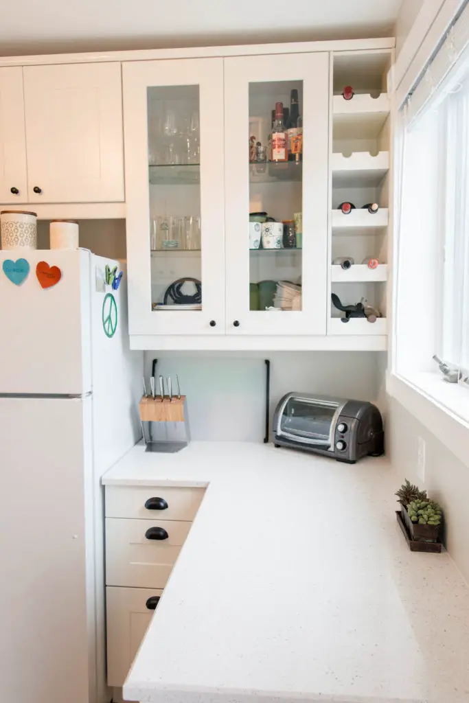 Ikea Grimslov kitchen upgrade. White on white kitchen with black drawer pulls. From | EffieRow.com