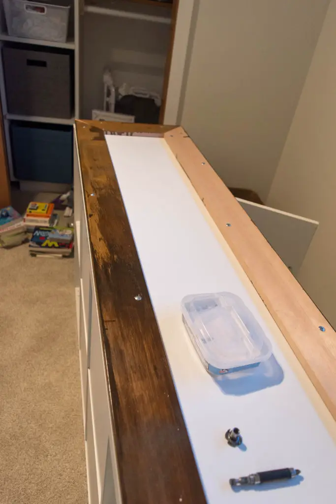 Ikea Kallax changing table. Customized to match Baby Mod Marley crib in a modern gender-neutral nursery.