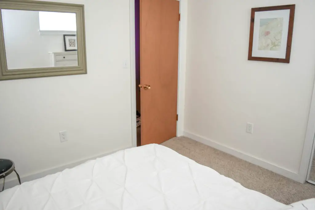 Wood doors with white trim in a mid century home. 