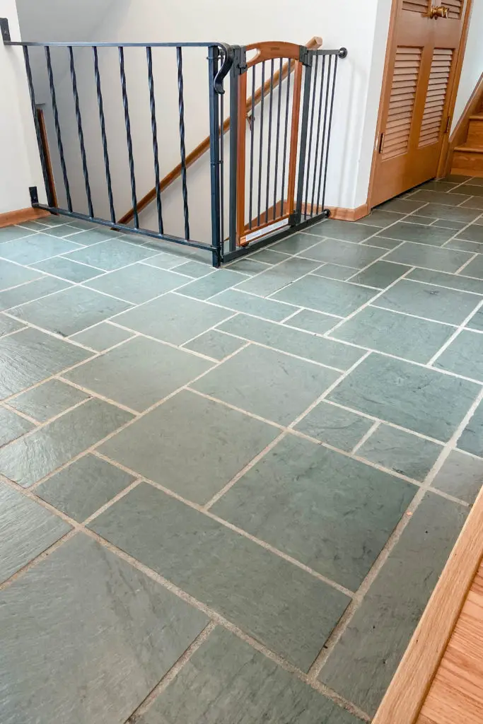 Gorgeous jade green slate tiles - completely refinished in this mid century entryway. | EffieRow.com