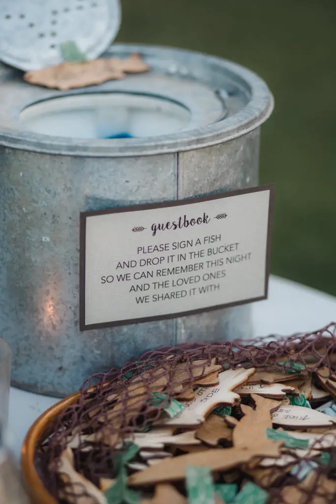 Fishing-themed wedding guestbook. Have guests sign a fish which can later be mounted or framed as artwork for the home. | EffieRow.com
10 Ways to Personalize A Wedding
#weddingguestbook #uniqueguestbook #fishingthemewedding #fishingthemeguestbook #diyguestbook #fishguestbook