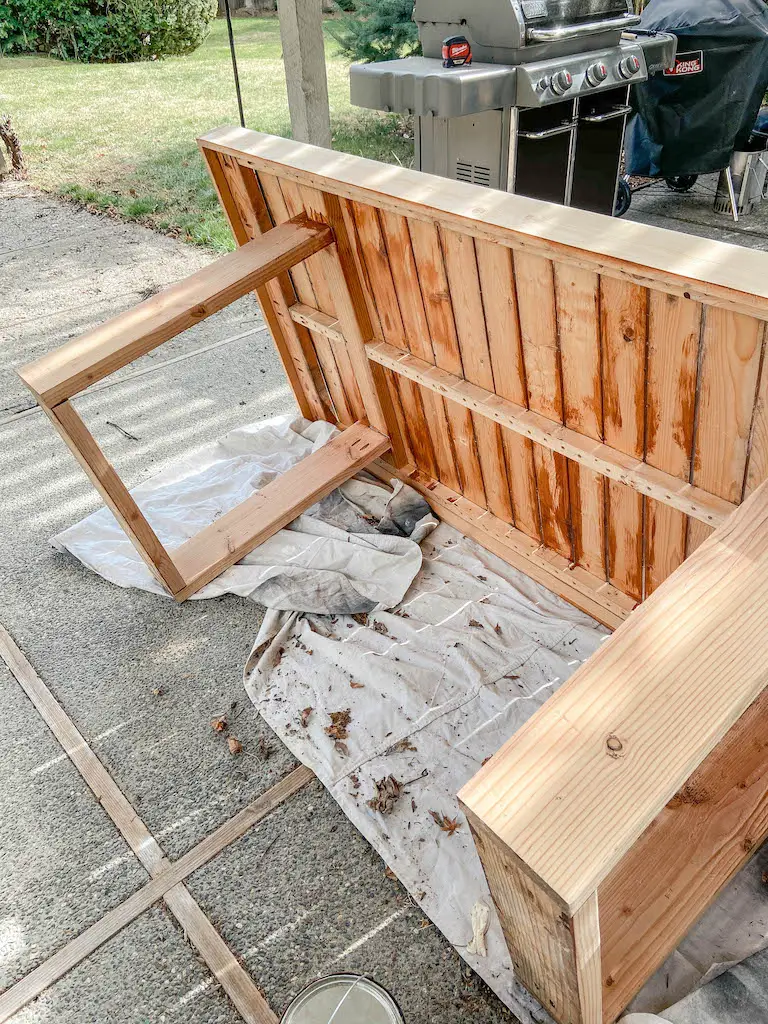 Stripping and refinishing our DIY modern patio table. Refinished with Cabot Australian Timber Oil and Howard's SunShield Wax. | EffieRow.com