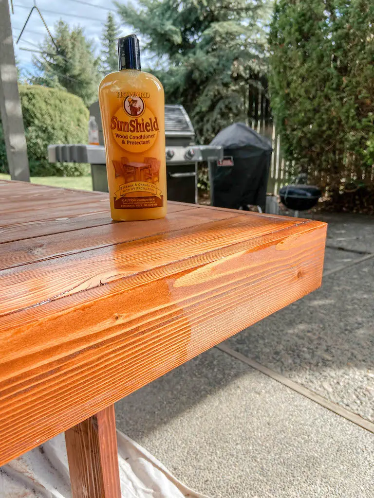 Refinishing our DIY modern patio table with Cabot Australian Timber Oil and Howard's SunShield Wax. | EffieRow.com