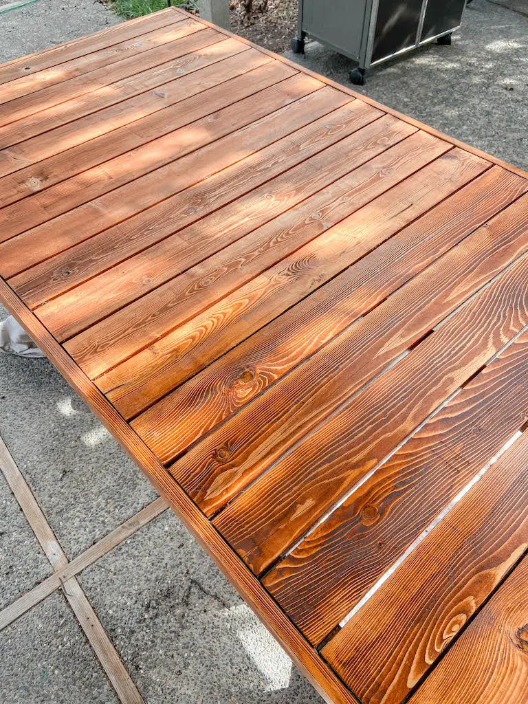 Refinishing our DIY modern patio table with Cabot Australian Timber Oil and Howard's SunShield Wax. | EffieRow.com